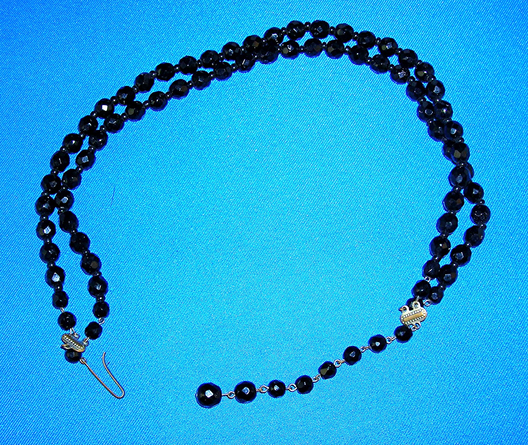 Double Row Of Faceted Jet/Glass Beads